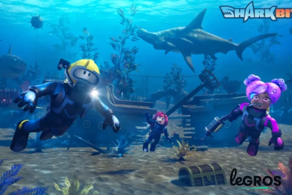 Trois plongeurs animés explorent une scène sous-marine avec une épave, un coffre au trésor et un requin marteau, avec les logos "SharkBite" et "Legros" visibles.
